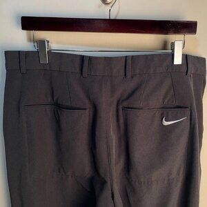 Nike Golf Men's dark gray flat front Standard Fit performance Pants 34 x 34